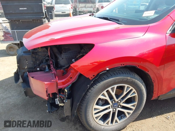 2020 Ford Escape SEL z VIN 1FMCU0H6XLUB62303, wystawiony jako IAAI lot #42646790 z przebiegiem 70 895 mil mil oraz . Historia ofert i sprzedaży dostępna na DreamBid. Obrazek 19.