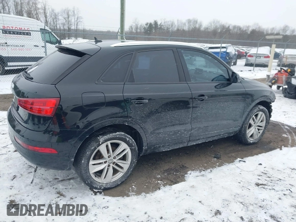 2017 Audi Q3 Premium with VIN WA1BCCFSXHR012345, listed as a IAAI auction lot 41589844 with 125,044 mi miles and . Bid and sale history available at DreamBid. Image 13.