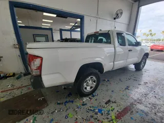 2016 Toyota Tacoma SR with VIN 5TFRX5GN2GX067461, listed as a IAAI auction lot 42731292 with 135,105 mi miles and . Bid and sale history available at DreamBid. Image 3.