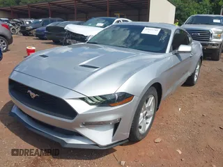 2018 Ford Mustang EcoBoost z VIN 1FA6P8TH6J5174509, wystawiony jako IAAI lot #42627744 z przebiegiem 83 093 mil mil oraz . Historia ofert i sprzedaży dostępna na DreamBid. Obrazek 17.