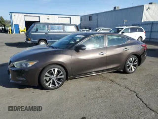2016 Nissan Maxima SL with VIN 1N4AA6AP4GC900754, listed as a Copart auction lot 60664465 with 72,218 mi miles and Salvage title. Bid and sale history available at DreamBid. Image 1.
