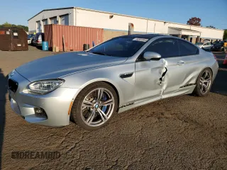 2013 BMW M6 z VIN WBSLX9C58DD159800, wystawiony jako Copart lot #68904984 z przebiegiem 107 426 mil mil oraz Szkoda całkowita • Salvage title. Historia ofert i sprzedaży dostępna na DreamBid. Obrazek 1.