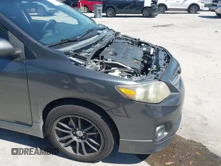 2011 Toyota Corolla L with VIN 2T1BU4EE8BC667772, listed as a IAAI auction lot 41960526 with 219,911 mi miles. Bid and sale history available at carsss.com. Image 21.