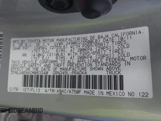 2012 Toyota Tacoma with VIN 3TMLU4ENXCM083340, listed as a IAAI auction lot 41704584 with 120,944 mi miles and . Bid and sale history available at DreamBid. Image 9.