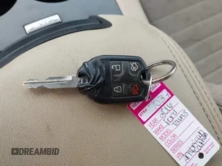2016 Ford Taurus SE z VIN 1FAHP2D83GG131408, wystawiony jako IAAI lot #41552981 z przebiegiem 151 295 mil mil oraz . Historia ofert i sprzedaży dostępna na DreamBid. Obrazek 11.