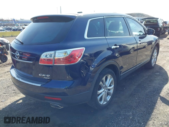 2012 Mazda CX-9 Grand Touring with VIN JM3TB3DVXC0366378, listed as a IAAI auction lot 41798606 with 143,908 mi miles. Bid and sale history available at carsss.com. Image 4.