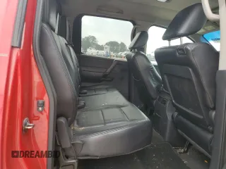 2012 Nissan Titan SV with VIN 1N6BA0EK4CN319941, listed as a Copart auction lot 43640705 with 210,885 mi miles and Salvage Title. Bid and sale history available at DreamBid. Image 10.