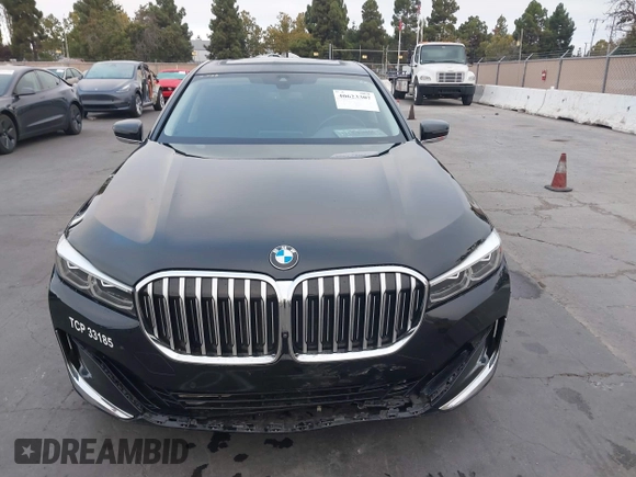 2022 BMW 7 Series 740i with VIN WBA7T2C0XNCJ31291, listed as a IAAI auction lot 40623307 with 98,877 mi miles. Bid and sale history available at carsss.com. Image 12.