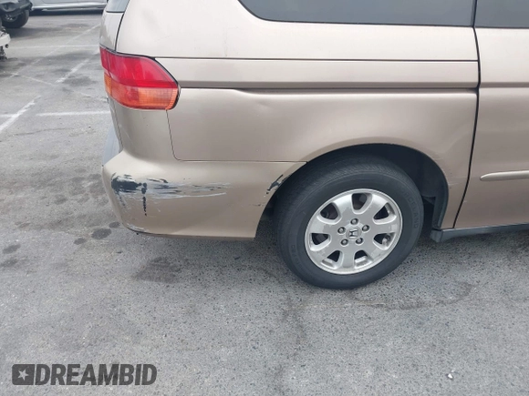 2003 Honda Odyssey EX with VIN 5FNRL186X3B074397, listed as a IAAI auction lot 41164455 with 275,188 mi miles and . Bid and sale history available at DreamBid. Image 12.
