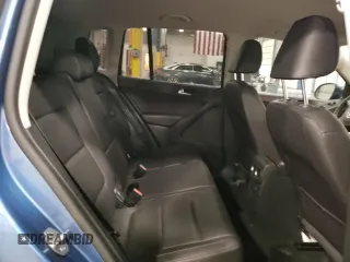 2017 Volkswagen Tiguan S z VIN WVGBV7AX4HK039281, wystawiony jako Copart lot #88013955 z przebiegiem 88 878 mil mil oraz Szkoda całkowita • Salvage title. Historia ofert i sprzedaży dostępna na DreamBid. Obrazek 11.