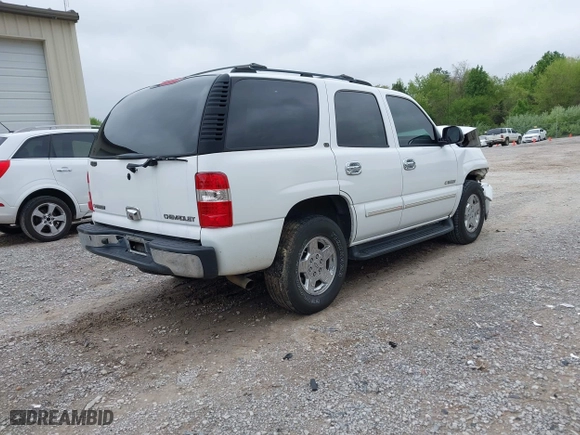 2003 Chevrolet Tahoe LT with VIN 1GNEC13Z93R305114, listed as a IAAI auction lot 41956937 with 176,305 mi miles. Bid and sale history available at carsss.com. Image 4.