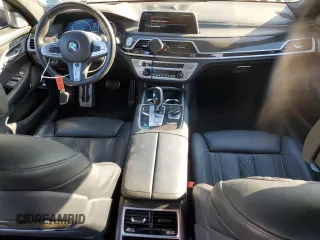 2019 BMW 7 Series M760i xDrive with VIN WBA7H6C55KG615037, listed as a Copart auction lot 80218404 with 43,405 mi miles and Salvage Title. Bid and sale history available at carsss.com. Image 8.