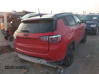 2019 Jeep Compass Altitude z VIN 3C4NJCBB4KT755810, wystawiony jako IAAI lot #41197022 z przebiegiem 66 456 mil mil oraz . Historia ofert i sprzedaży dostępna na DreamBid. Obrazek 4.