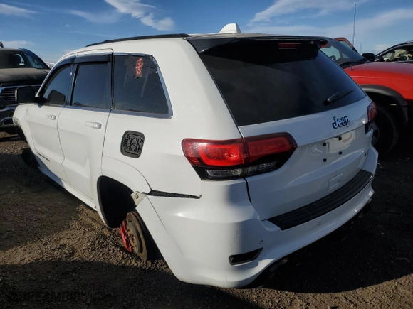 2015 Jeep Grand Cherokee SRT with VIN 1C4RJFDJ8FC687469, listed as a Copart auction lot 85270104 with 0 mi miles and Salvage Title. Bid and sale history available at carsss.com. Image 2.