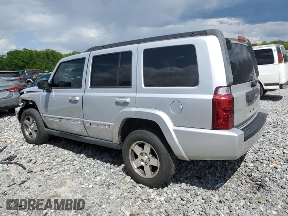 2009 Jeep Commander Sport with VIN 1J8HH48K89C540189, listed as a Copart auction lot 52552235 with 258,377 mi miles and Salvage title. Bid and sale history available at DreamBid. Image 2.