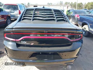 2019 Dodge Charger SXT with VIN 2C3CDXJG4KH710673, listed as a IAAI auction lot 41469797 with 102,011 mi miles and . Bid and sale history available at DreamBid. Image 17.
