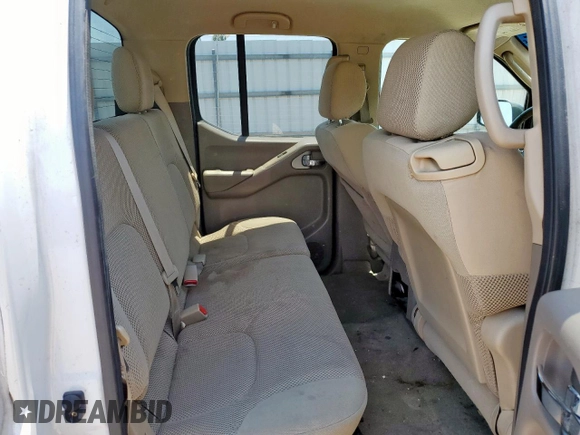 2009 Nissan Frontier SE with VIN 1N6AD07U29C400846, listed as a Copart auction lot 56419735 with 143,005 mi miles and Salvage title. Bid and sale history available at DreamBid. Image 10.