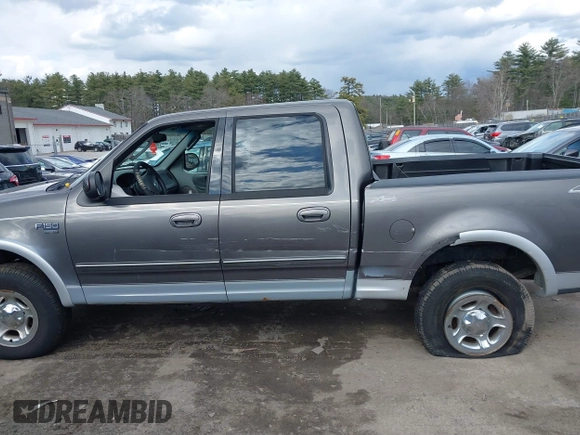 2003 Ford F-150 XLT with VIN 1FTRW08L63KA37275, listed as a IAAI auction lot 41875128 with 133,257 mi miles. Bid and sale history available at carsss.com. Image 14.