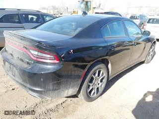2016 Dodge Charger SXT with VIN 2C3CDXJG5GH105388, listed as a IAAI auction lot 41865086 with 57,535 mi miles. Bid and sale history available at carsss.com. Image 4.