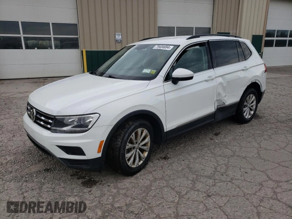 2018 Volkswagen Tiguan SEL with VIN 3VV2B7AX9JM065985, listed as a Copart auction lot 79404694 with Not provided miles and Salvage title. Bid and sale history available at DreamBid. Image 1.