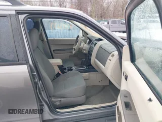 2012 Ford Escape XLS z VIN 1FMCU9C72CKA10130, wystawiony jako IAAI lot #41543233 z przebiegiem 168 552 mil mil oraz . Historia ofert i sprzedaży dostępna na DreamBid. Obrazek 5.