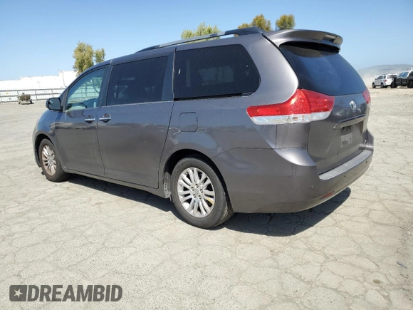 2011 Toyota Sienna XLE AAS with VIN 5TDYK3DC1BS117671, listed as a Copart auction lot 53918185 with 114,136 mi miles and Salvage Title. Bid and sale history available at carsss.com. Image 2.