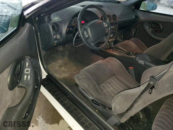 1998 Pontiac Firebird with VIN 2G2FS22KXW2207621, listed as a Copart auction lot 82717434 with 63,973 mi miles and Salvage Title. Bid and sale history available at carsss.com. Image 8.