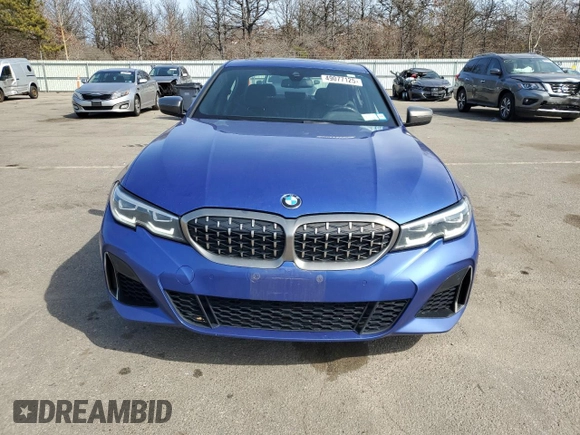 2020 BMW 3 Series M340i xDrive with VIN WBA5U9C00LFH68766, listed as a Copart auction lot 49077125 with 56,730 mi miles and Salvage Title. Bid and sale history available at DreamBid. Image 5.
