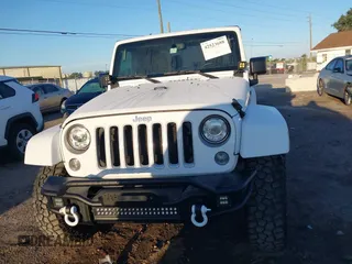 2018 Jeep Wrangler Sahara with VIN 1C4AJWBG2JL821132, listed as a IAAI auction lot 42523688 with 86,244 mi miles and . Bid and sale history available at DreamBid. Image 12.