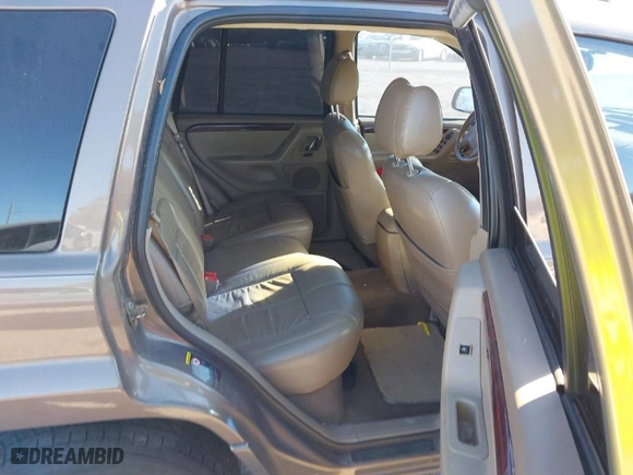 2002 Jeep Grand Cherokee Limited with VIN 1J8GW58N12C268589, listed as a IAAI auction lot 41748099 with 146,673 mi miles. Bid and sale history available at carsss.com. Image 8.