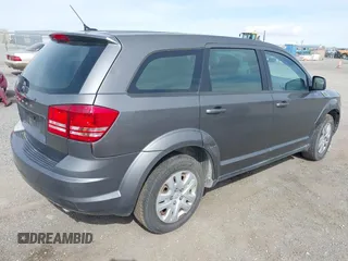 2013 Dodge Journey SE with VIN 3C4PDCAB7DT675440, listed as a IAAI auction lot 41927853 with 263,264 mi miles. Bid and sale history available at carsss.com. Image 4.