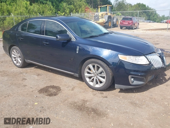 2009 Lincoln MKS z VIN 1LNHM93R69G625590, wystawiony jako IAAI lot #42270653 z przebiegiem 101 024 mil mil oraz . Historia ofert i sprzedaży dostępna na DreamBid. Obrazek 1.