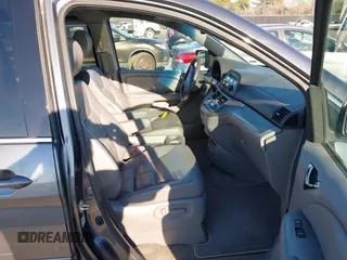 2010 Honda Odyssey EX-L with VIN 5FNRL3H76AB010388, listed as a IAAI auction lot 41678322 with 197,826 mi miles and . Bid and sale history available at carsss.com. Image 5.