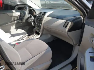 2011 Toyota Corolla L with VIN JTDBU4EE0B9154747, listed as a IAAI auction lot 42028887 with 141,569 mi miles. Bid and sale history available at carsss.com. Image 5.