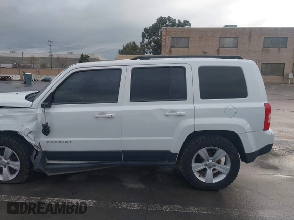 2014 Jeep Patriot Sport with VIN 1C4NJRBB3ED509117, listed as a IAAI auction lot 41799057 with 161,663 mi miles. Bid and sale history available at carsss.com. Image 14.