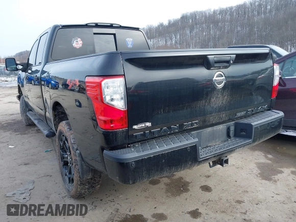 2018 Nissan Titan XD SV with VIN 1N6BA1F49JN521838, listed as a IAAI auction lot 41606878 with 143,742 mi miles. Bid and sale history available at carsss.com. Image 3.