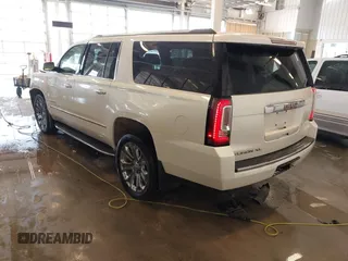 2015 GMC Yukon XL Denali with VIN 1GKS2JKJXFR528927, listed as a IAAI auction lot 41391259 with 159,467 mi miles. Bid and sale history available at carsss.com. Image 3.