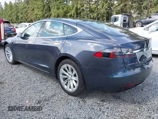 2017 Tesla Model S 100D with VIN 5YJSA1E27HF202563, listed as a IAAI auction lot 42460702 with 71,715 mi miles and . Bid and sale history available at DreamBid. Image 3.