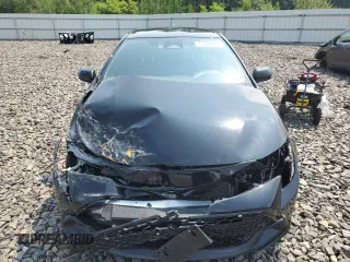 2024 Toyota Corolla Hatchback SE with VIN JTND4MBE7R3214545, listed as a Copart auction lot 65226474 with 8,283 mi miles and Salvage Title. Bid and sale history available at carsss.com. Image 5.