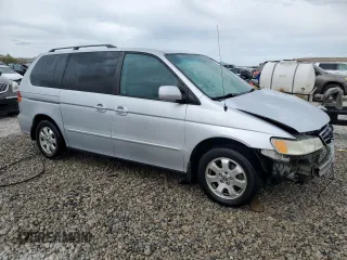 2004 Honda Odyssey EX-RES z VIN 5FNRL18804B121844, wystawiony jako Copart lot #53390135 z przebiegiem 284 065 mil mil oraz Szkoda całkowita • Salvage title. Historia ofert i sprzedaży dostępna na DreamBid. Obrazek 4.