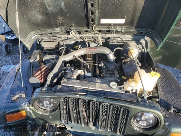 1997 Jeep Wrangler Sahara with VIN 1J4FY49S4VP507006, listed as a Copart auction lot 82319014 with 134,582 mi miles and Salvage Title. Bid and sale history available at carsss.com. Image 12.