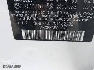 2021 Hyundai Sonata Hybrid SEL with VIN KMHL34JJ7MA032703, listed as a IAAI auction lot 41252575 with 22,067 mi miles. Bid and sale history available at carsss.com. Image 9.