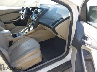 2012 Ford Focus SEL with VIN 1FAHP3H23CL183151, listed as a IAAI auction lot 41800487 with 165,370 mi miles. Bid and sale history available at carsss.com. Image 5.