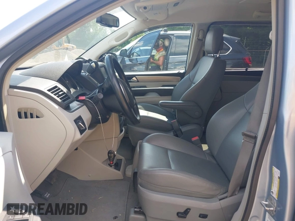 2012 Volkswagen Routan SE with VIN 2C4RVABG7CR309337, listed as a IAAI auction lot 42610070 with 117,214 mi miles and . Bid and sale history available at DreamBid. Image 5.