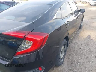 2016 Honda Civic Sedan LX with VIN 19XFC2F57GE019341, listed as a IAAI auction lot 42054403 with 136,768 mi miles. Bid and sale history available at carsss.com. Image 4.