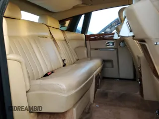 2006 Rolls-Royce Phantom z VIN SCA1S684X6UX08208, wystawiony jako Copart lot #77905764 z przebiegiem 108 986 mil mil oraz Szkody całkowita. Historia ofert i sprzedaży dostępna na DreamBid. Obrazek 10.