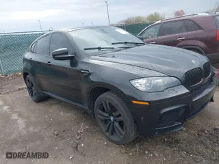 2012 BMW X6 M with VIN 5YMGZ0C58CLK14885, listed as a IAAI auction lot 42082928 with 131,900 mi miles. Bid and sale history available at carsss.com. Image 1.