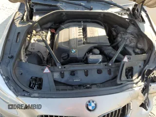 2014 BMW 5 Series GT 535i with VIN WBA5M2C55ED085766, listed as a Copart auction lot 76716934 with 151,144 mi miles and Salvage Title. Bid and sale history available at carsss.com. Image 7.