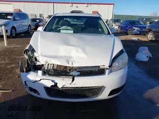 2014 Chevrolet Impala LTZ with VIN 2G1WC5E31E1157669, listed as a IAAI auction lot 41429789 with 122,239 mi miles and . Bid and sale history available at DreamBid. Image 12.