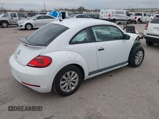 2018 Volkswagen Beetle S with VIN 3VWFD7AT4JM701569, listed as a IAAI auction lot 41106340 with 78,754 mi miles. Bid and sale history available at carsss.com. Image 4.